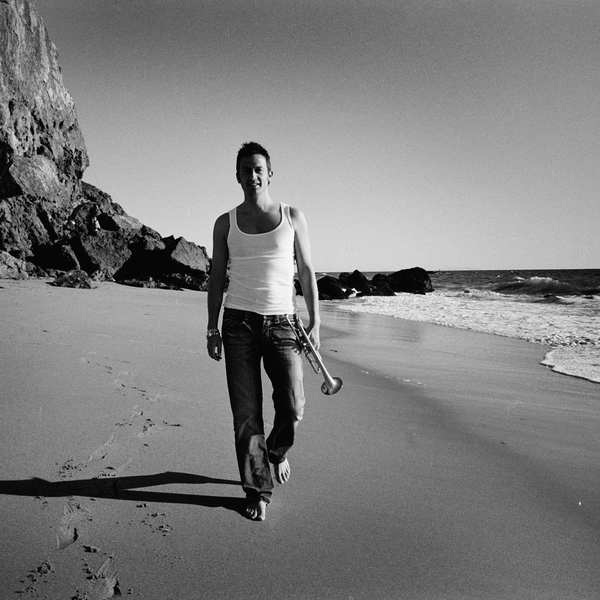 Till walking on beach